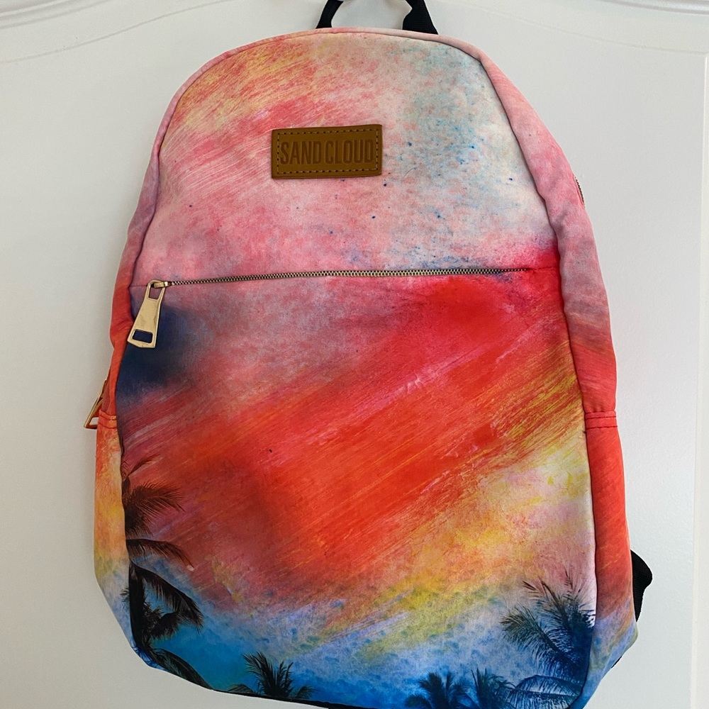 Sand Cloud backpack. Gorgeous colors beach sunset colors with palm trees